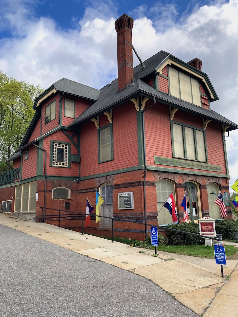A view of the Mill Museum's Dunham Hall (main building) from the parking lot entrance.
